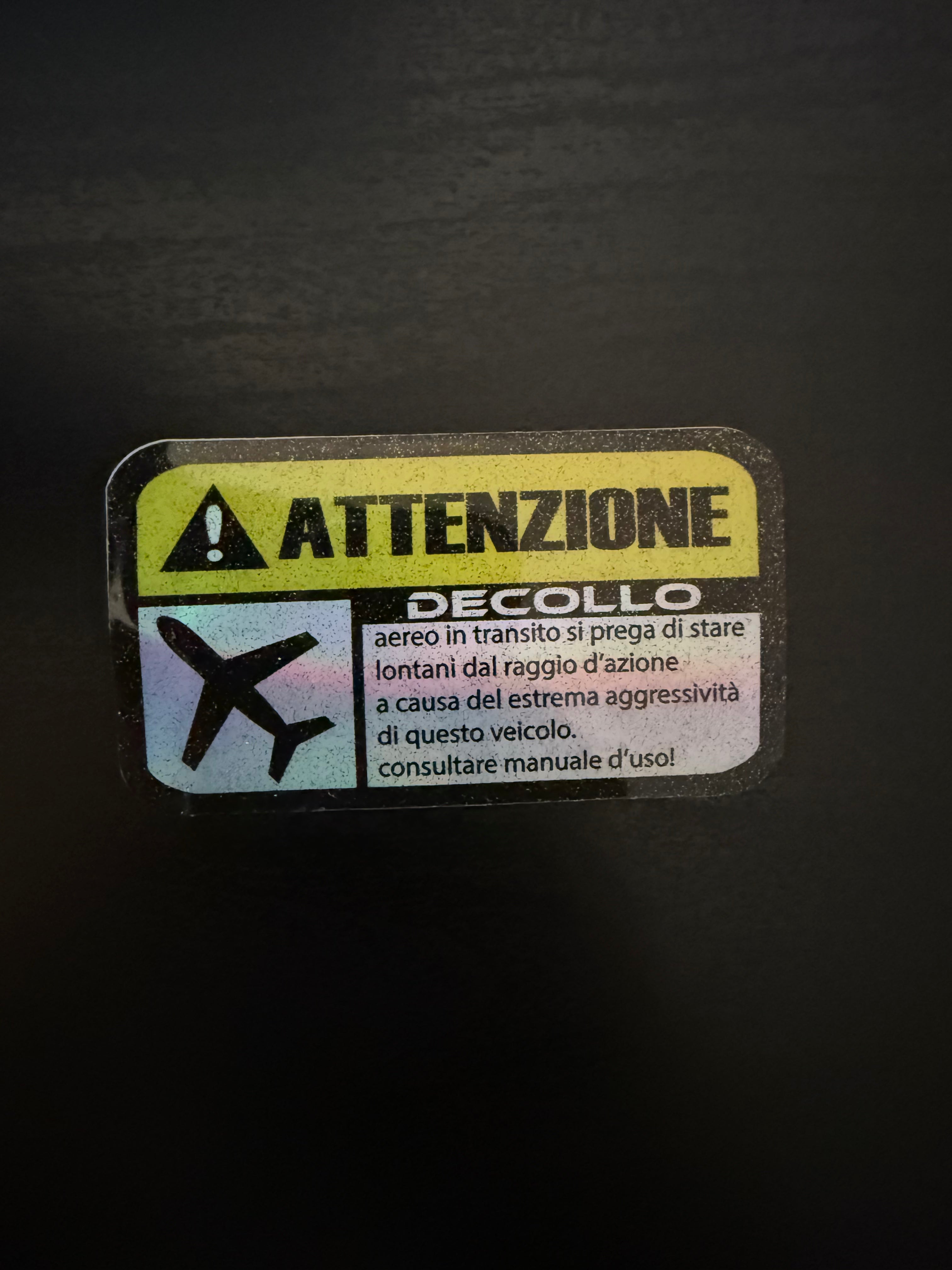 Adesivo Attenzione Decollo