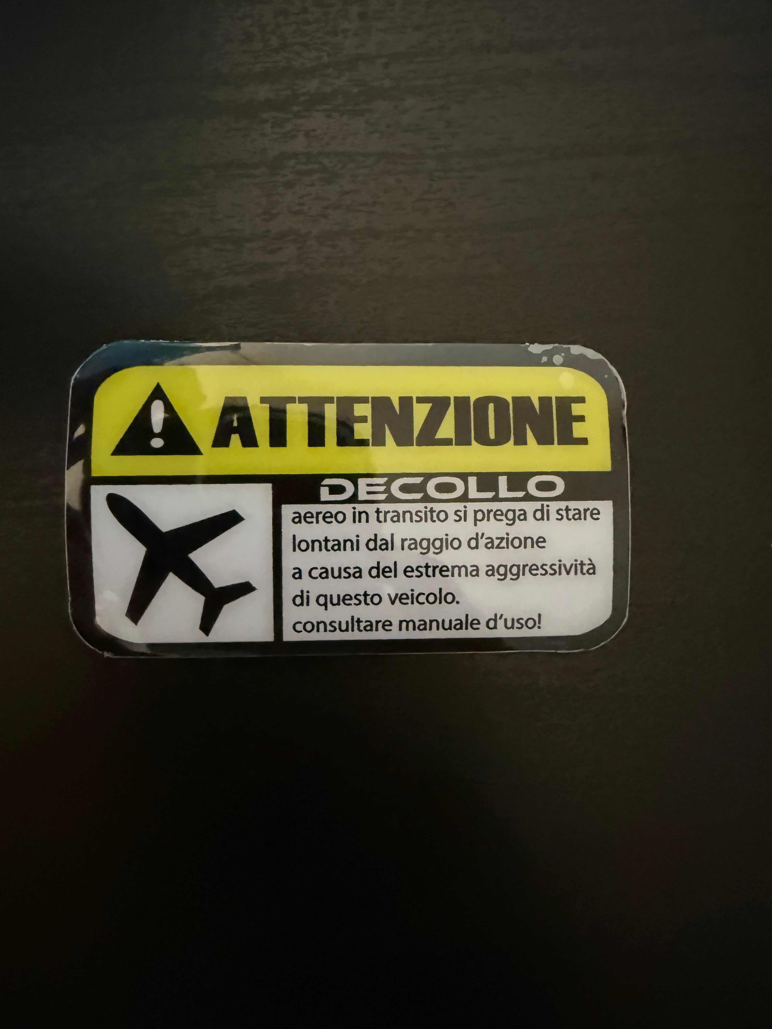 Adesivo Attenzione Decollo